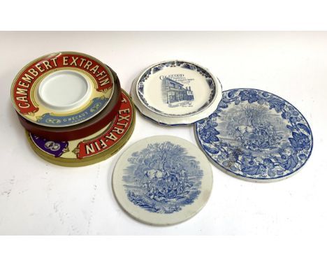 A graduating pair of Copeland Spode ceramic cheese stands depicting hunting scenes, a modern Camembert dish and a Coalford in