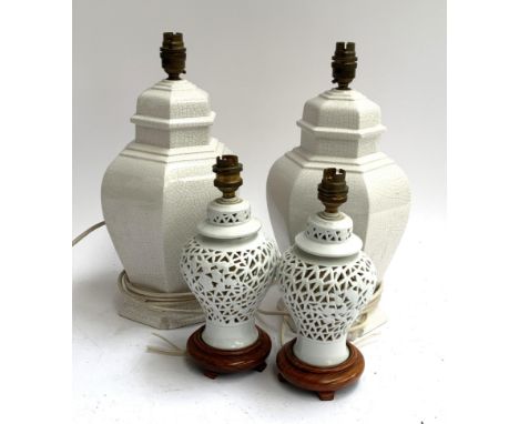 A pair of ceramic hexagonal baluster form table lamps; together with two others, 37cmH 