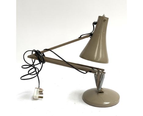 An anglepoise lamp, in mushroom 