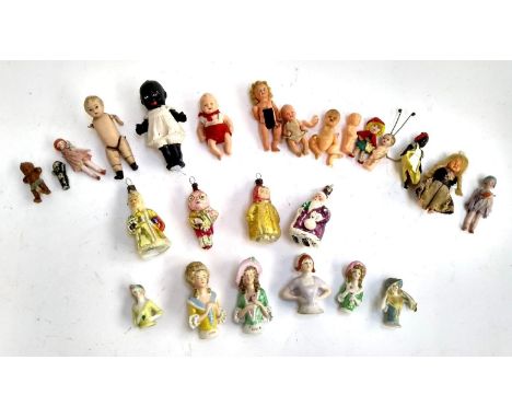 A mixed lot to include vintage glass Christmas tree decorations; ceramic lady pin cushion toppers; miniature dolls etc 