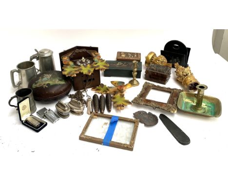 A mixed lot to include a cuckoo clock, lacquered circular box, painted wooden boxes, tankard, candlesticks, Ronson lighters e