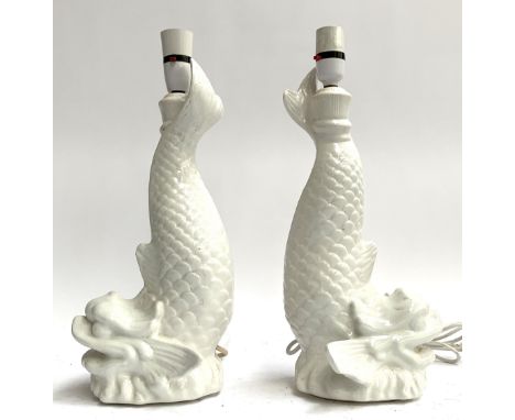 A pair of white glazed ceramic Casa Pupo dolphin table lamps, 42cmH to top of fitting