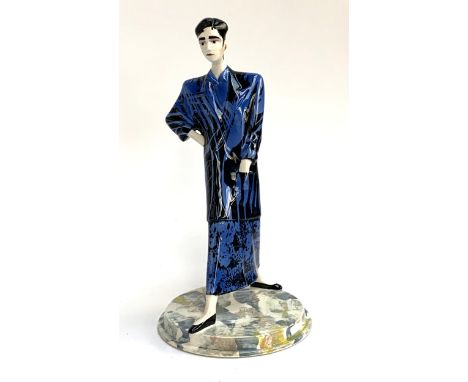 A vintage Dennis Chinaworks ceramic figurine modelled by Roger Mitchell 1985, suit by Japanese fashion designer Yohji Yamamot