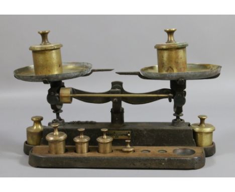 A pair of American cast iron and brass weighing scales by Henry Troemner, Philadelphia, P.A. along with eight Imperial brass 