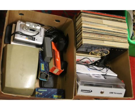 Two boxes of assorted cameras and accessories, LP records, Zennox USB turntable and Aldis projector, etc.