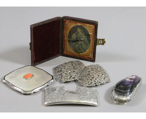A small box of collectables to include silver and coral powder compact, nurses belt, daguerreotype, silver card case, etc.
