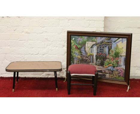 A firescreen set with woolwork picture along with a retro table and small stool.