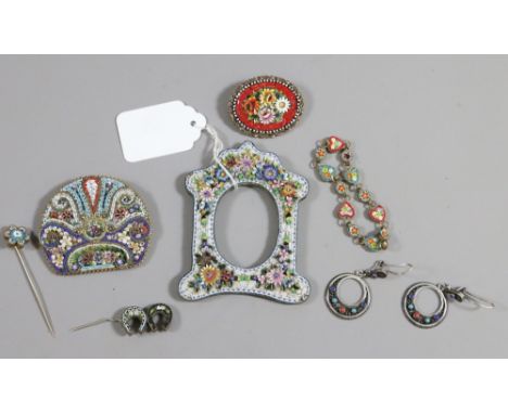 A collection of micro mosaic wares including picture frame, bracket and brooches etc.