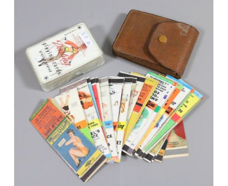A collection of 1950s pin up cases and two cased sets of playing cards.