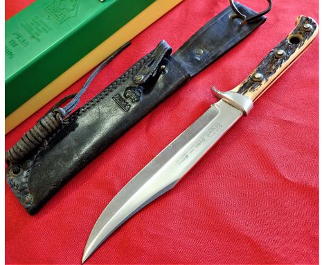 Stag grips, with nickel fittings, being numbered 41272 to inside of guard. 16.5 m long nickel bowie blade with sawtooth edge.