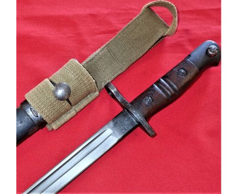 Steel pommel with wooden grips and steel hilt. Very good condition 43 cm long blade, maker stamped for Remington &amp; dated 