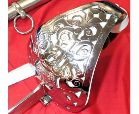 Features a wire-bound fish skin grip, mounted onto a plain chromed back strap and pierced bowl guard, featuring the royal cyp