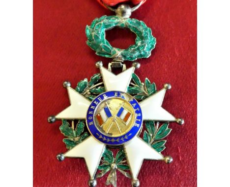 Spotless enamel to cross arms/foliage, with light enamel wear to blue ribbands. Medal housed in Arthus Bertrand award case.&n