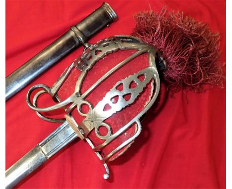 Features plated, nickel-pierced basket hilt, with minor plating loss, full leather inner guard, with some loss of red felt to