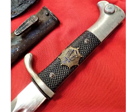 Chequered composite grips, one side showing enamel &amp; gilt R.L.B. badge, with nickel-plated doves head pommel and fittings