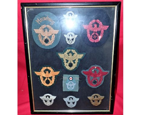 Ex-collectors display, including arm patches, cap badges, including patch from district Merseburg. Metal badges all retain pr