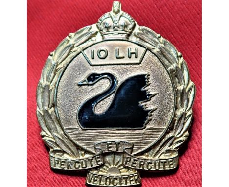 Good toned gilt badge, with central enamel black swan. Loops to rear.&nbsp;