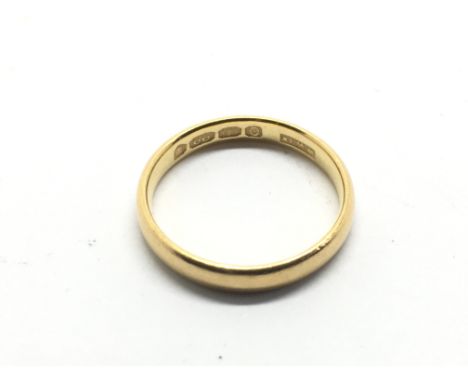 A 22ct gold wedding band, approx 3g and approx size K.