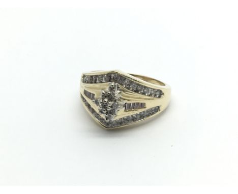 A 9carat gold ring set with a pattern of diamonds approximately 0.50 of a carat ring size M-N