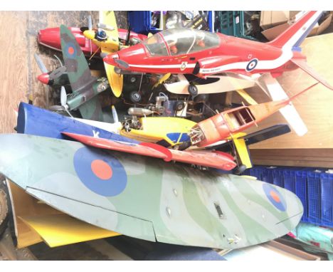 A Collection of fuel driven model aeroplanes in different states, ideal for spare parts.
