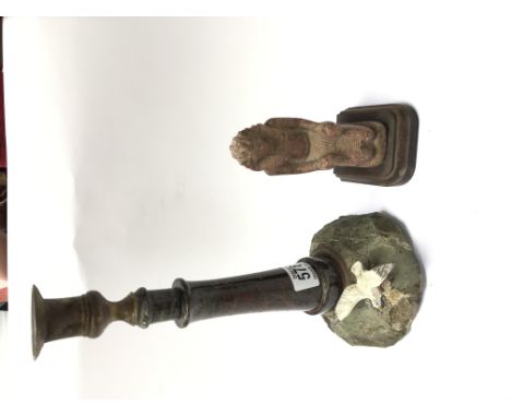 Serpentine lighthouse candle stick on Rocky base and carved stone ancient Egyptian style figure.