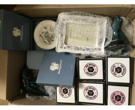 A box of ceramic items comprising Wedgewood dishes, Poole dolphins etc.