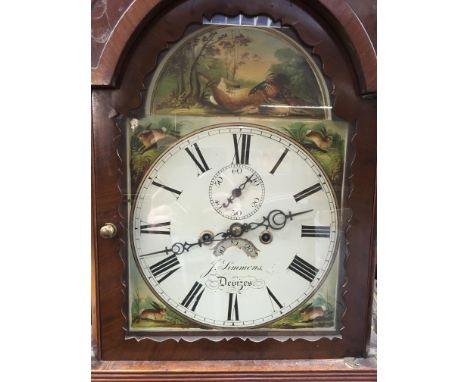 A Victorian mahogany long case clock the arched dial with Roman numerals second dial and date aperture maker J Simmons