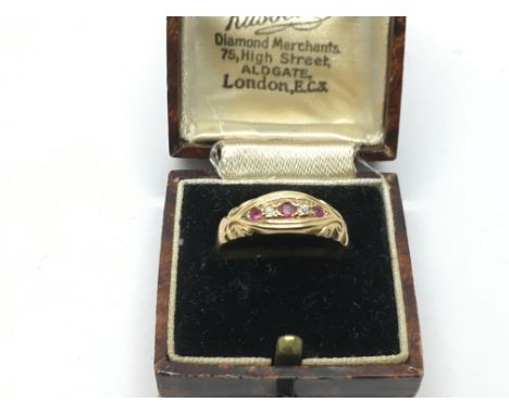 An 18ct gold ruby and diamond ring, approx 2g and approx size N-O.