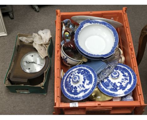 A box containing decorative ceramics blue and Ahmet China a smiths oak cased mantel clock and other oddments.