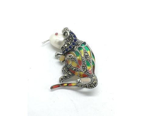 A silver plique-a-jour mouse brooch/pendant set with cultured pearl, opal, sapphires, ruby and marcasites.