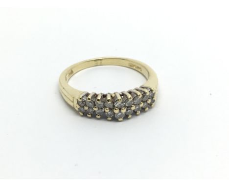 An 18carat gold ring set with two rows of diamonds ring size N-O