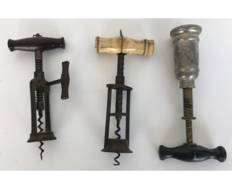 A Lund's patent London rack corkscrew, another bone handled corkscrew and a double helix corkscrew with engraved foliate deco