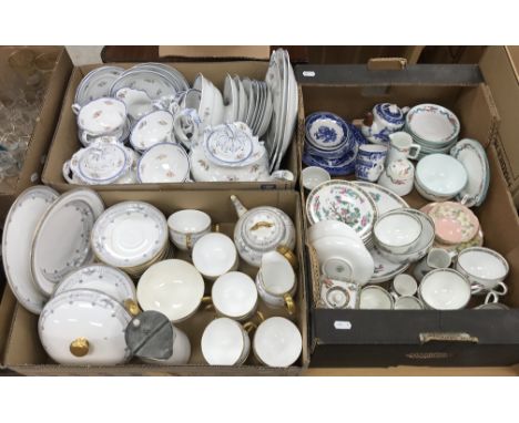 A box containing a Royal Worcester part tea service with classical decoration and gilt highlights dated 1922, a box containin