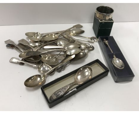 A quantity of silver teaspoons, sugar tongs and a silver napkin ring etc, weighable silver 13 oz