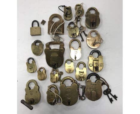 A collection of 20 various Victorian and later brass padlocks, 16 with keys, together with four further without keys, includi