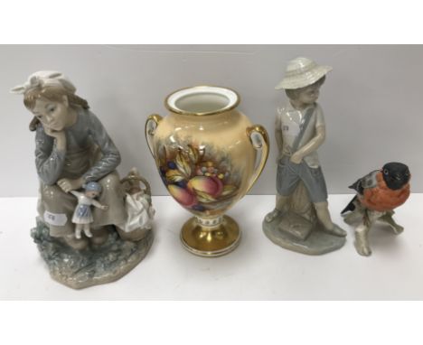 A Lladro figure "Girl with doll" together with Nao figure of boy with catapult, a Goebel figure of a bullfinch and an Anynsle