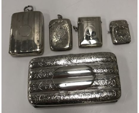 A collection of silver comprising a silver cigar case (by Henry Charles Freeman, Chester 1889), a silver cigarette case with 