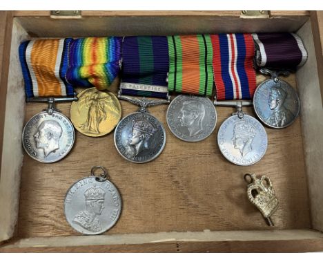 A medal bar comprising a British War medal and 1914-18 Victory medal, both inscribed "22068 Pte.E.R.B. Willis.Wilts.R" togeth