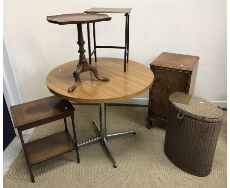 A modern laminated top simulated rosewood pedestal kitchen table, 91 cm diameter x 74 cm high, a burr walnut bedside cupboard