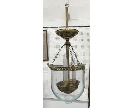 A set of three lacquered brass and glass three light ceiling lights with shades and a spare lighting column 60 cm deep 
