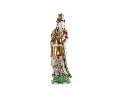 EARLY 20TH CENTURY CHINESE FIGURE OF GUANYIN, the female modelled standing and in floral decorated robes, holding a scroll in