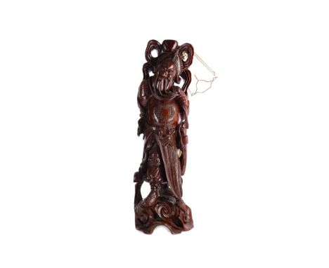 EARLY 20TH CENTURY CHINESE CARVED HARDWOOD FIGURAL LAMP, modelled with a warrior, 66cm high
