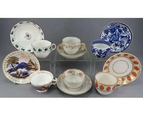 A group of early nineteenth century pottery and porcelain British cups and saucers, c. 1800-30. To include Derby, Spode and W