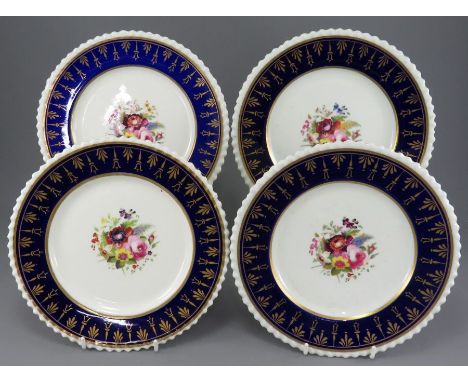 A set of four early nineteenth century porcelain hand-painted Chamberlains plates, c. 1820.  Each is decorated with floral ce