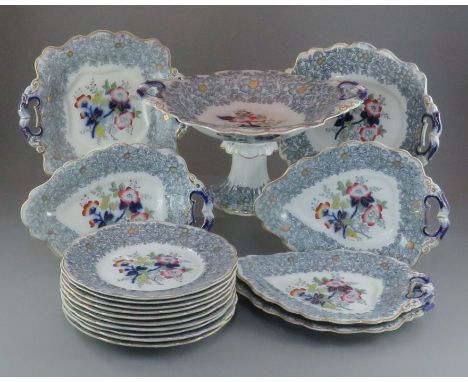 A mid-nineteenth century grey and white transfer-printed and coloured part dessert service, c. 1840-60. Comprising of: eleven