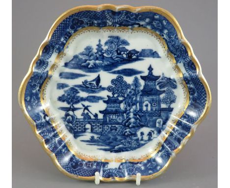 A late eighteenth century blue and white transfer-printed Caughley Temple pattern tea pot stand, c. 1790. 17 cm wide. (1)Cond