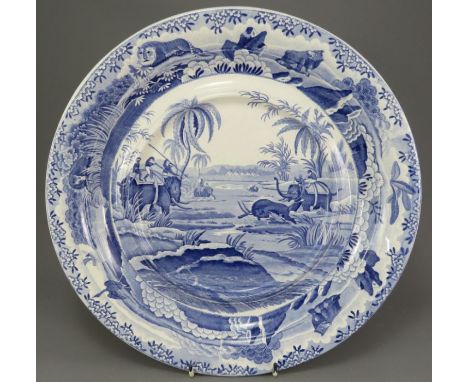 An early nineteenth century blue and white transfer-printed Spode Indian Sporting series soup tureen stand, c. 1810. It is ma