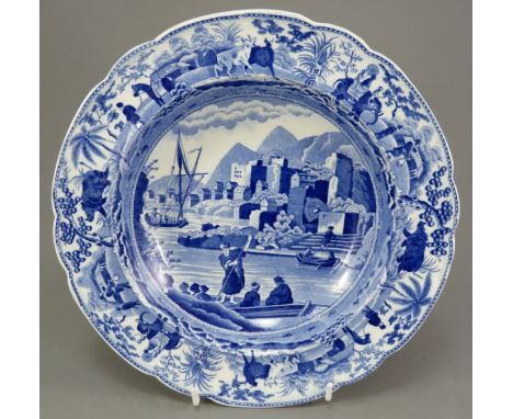 An early nineteenth century blue and white transfer-printed Spode Caramanian series pudding bowl, c. 1810. It is marked to th