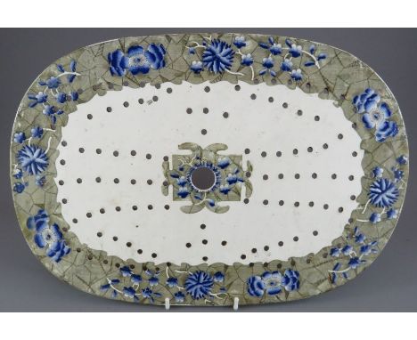 An early nineteenth century green and white transfer-printed Copeland & Garrett, Late Spode Marble border large drainer, c. 1