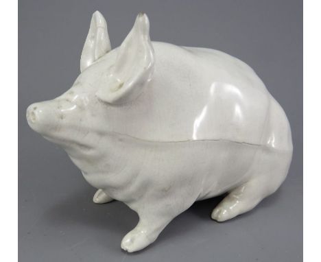 A late nineteenth century Scottish pottery Wemyss white, undecorated pig, c. 1890-1900. It is marked to the underside. 17 cm 